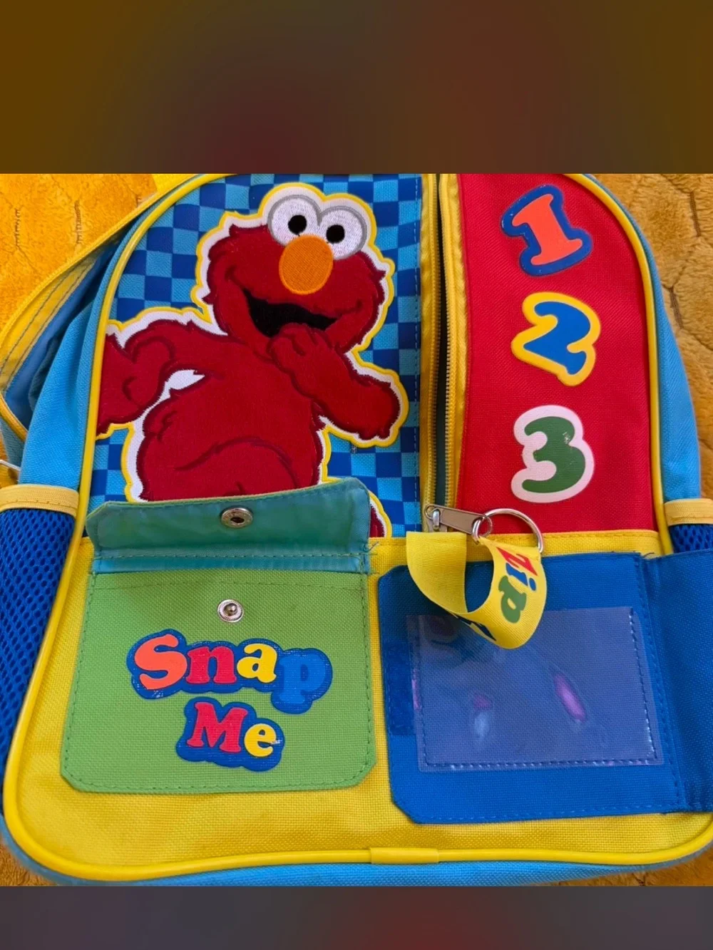 Sesame Street Elmo Learning Backpack - Blue, Red, Yellow, Green